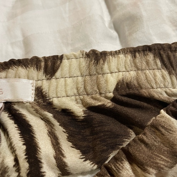 Chicos Sally Sarong Skirt Elastic Waist
Animal Print brown tan faux wrap SMALL - Picture 8 of 14